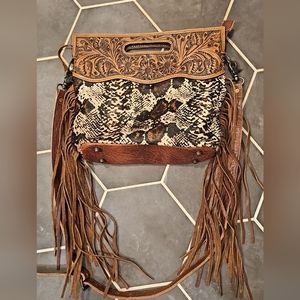 Cross body hand tooled purse